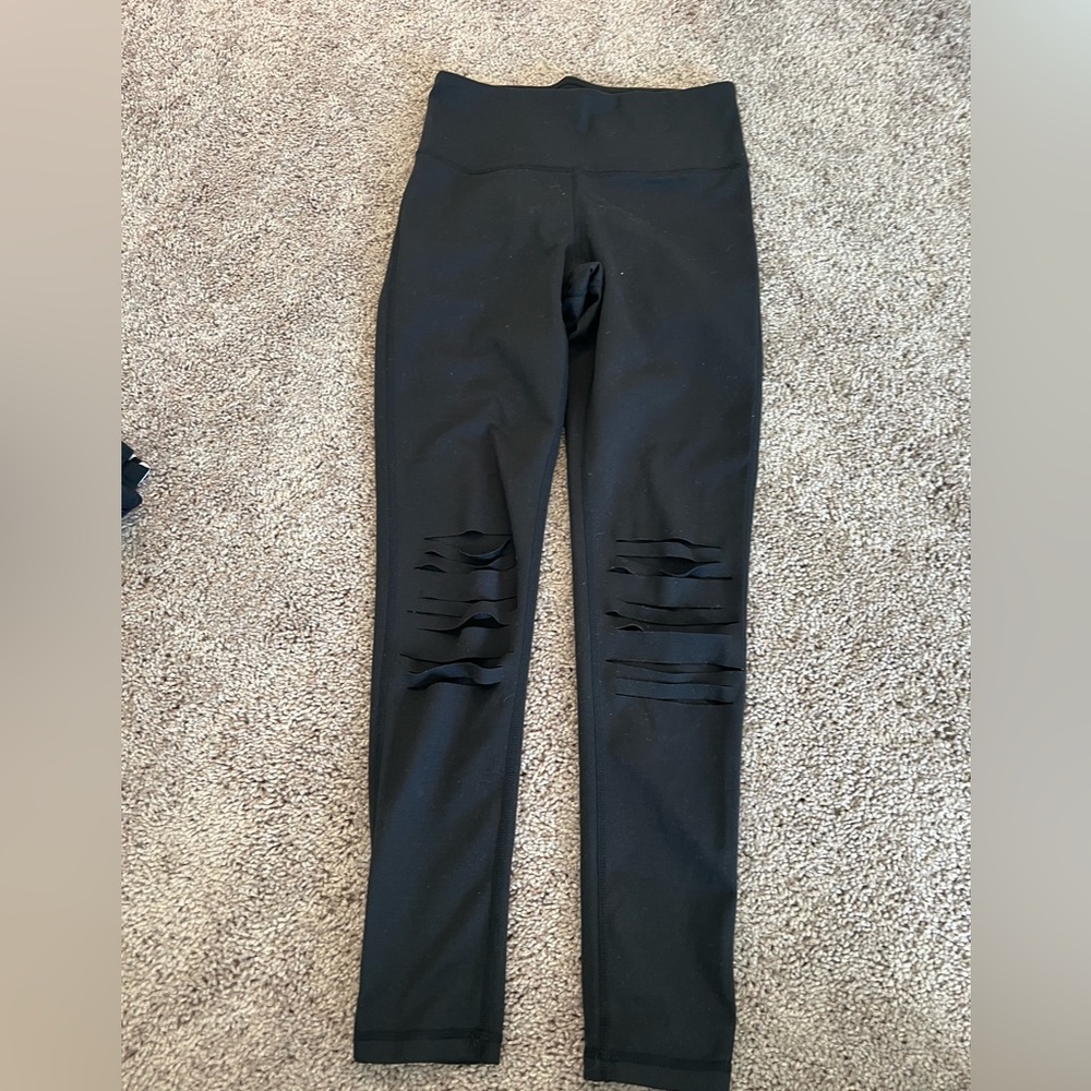Distressed knee black leggings